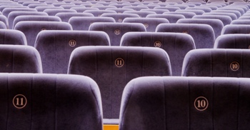 This photo of theatre seats waiting to be filled with theater patrons was taken by Janusz Gawron of Wadowice, Poland.